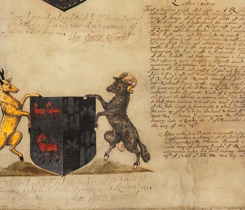 medieval illuminated text showing an heraldic achievement