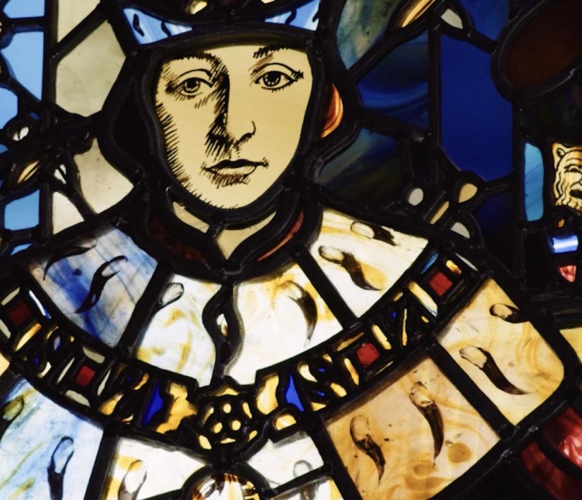 stained glass window depicting a king