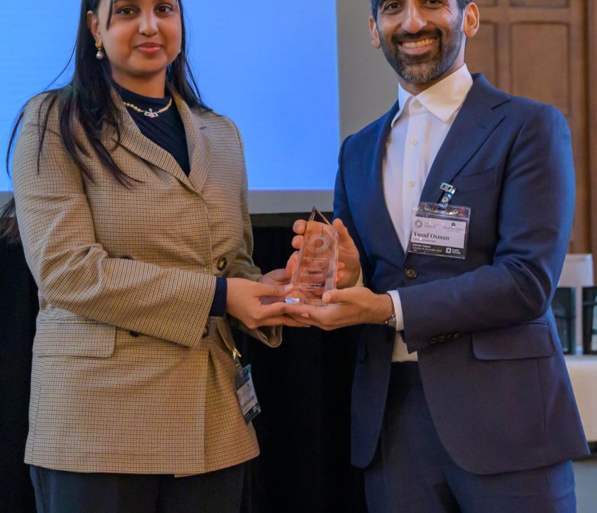 Woman receiving an award