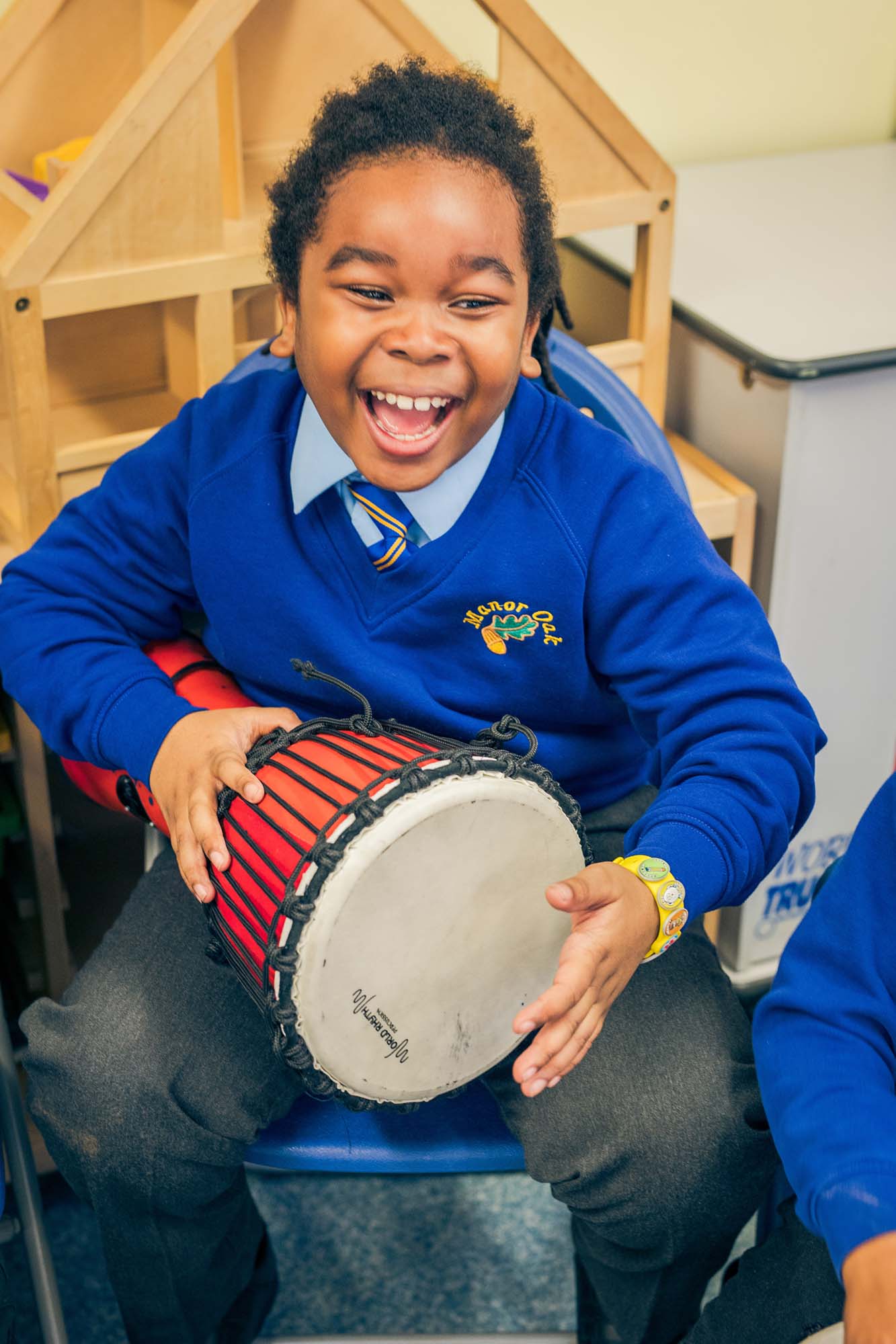 boy playing a drum