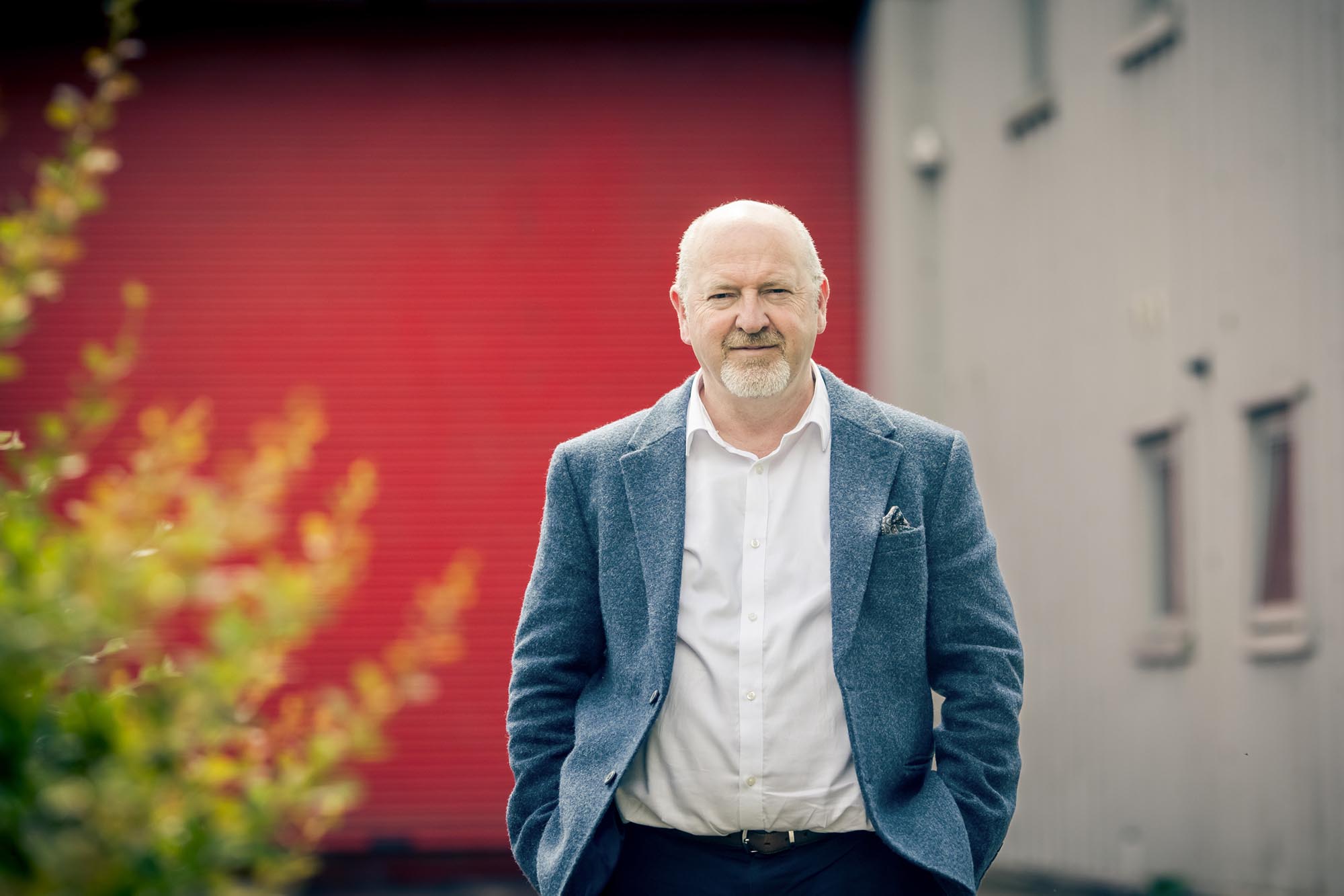 man in jacket standing outside