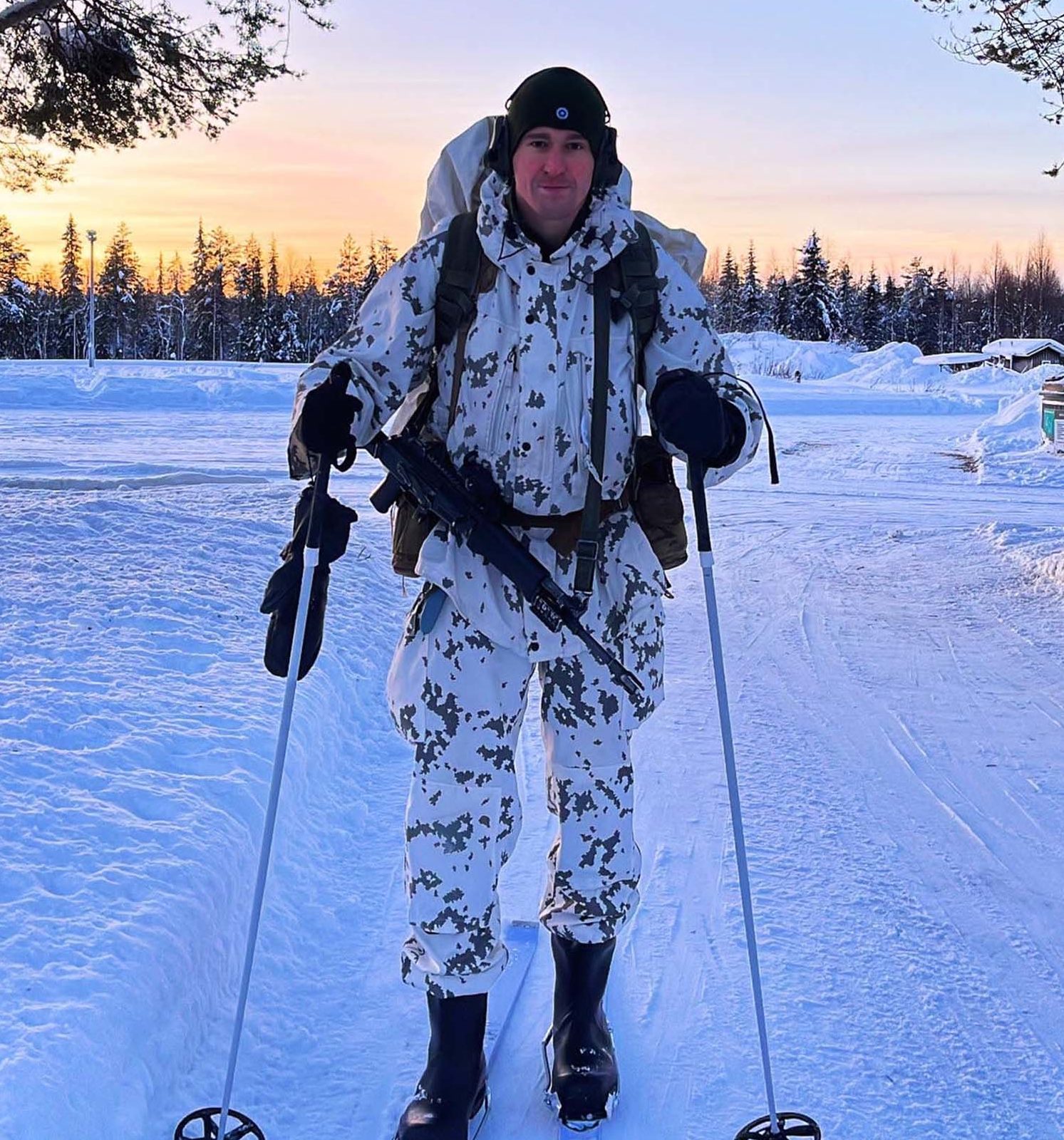soldier walking through an arctic landscape